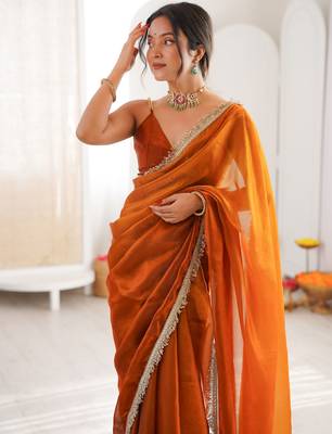 Mustard tissue satin sequins saree with unstitched blouse piece. 4
