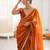 Mustard tissue satin sequins saree with unstitched blouse piece.