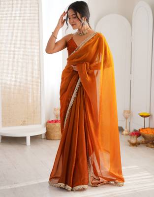 Mustard tissue satin sequins saree with unstitched blouse piece. 5