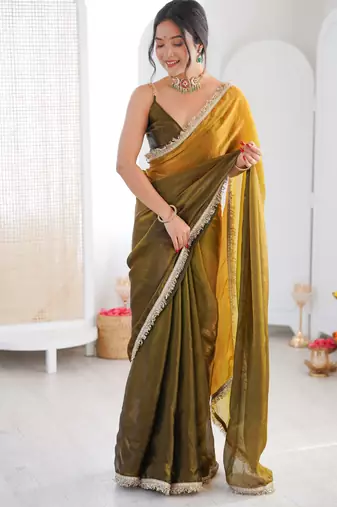 Olive tissue satin sequins saree with unstitched blouse piece.