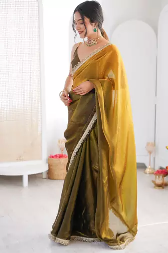 Olive tissue satin sequins saree with unstitched blouse piece.