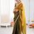Olive tissue satin sequins saree with unstitched blouse piece.