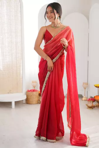 Red tissue satin sequins saree with unstitched blouse piece.