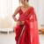 Red tissue satin sequins saree with unstitched blouse piece.