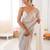 Cream chiffon embellished saree with unstitched blouse piece.