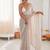 Cream chiffon embellished saree with unstitched blouse piece.
