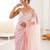 Pink chiffon embellished saree with unstitched blouse piece.