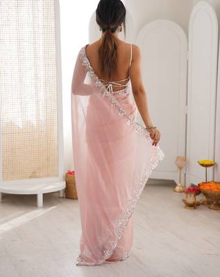 Pink chiffon embellished saree with unstitched blouse piece. 5