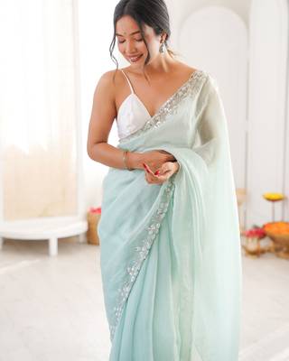 Sea green chiffon embellished saree with unstitched blouse piece. 1