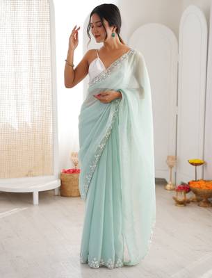 Sea green chiffon embellished saree with unstitched blouse piece. 2