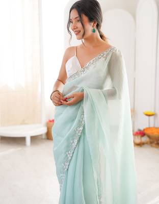 Sea green chiffon embellished saree with unstitched blouse piece. 4