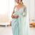 Sea green chiffon embellished saree with unstitched blouse piece.