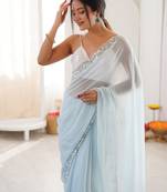 Sky blue chiffon embellished saree with unstitched blouse piece.