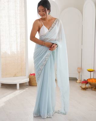 Sky blue chiffon embellished saree with unstitched blouse piece. 2