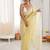 Yellow chiffon embellished saree with unstitched blouse piece.