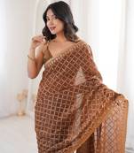 Brown chiffon embroidered saree with unstitched blouse piece.