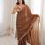 Brown chiffon embroidered saree with unstitched blouse piece.