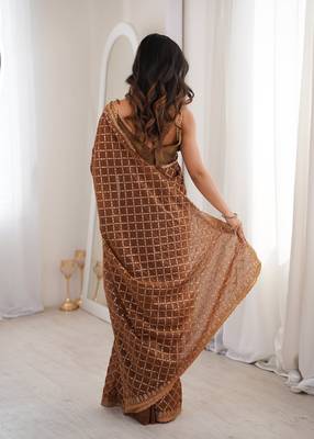 Brown chiffon embroidered saree with unstitched blouse piece. 4