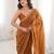 Mustard chiffon embroidered saree with unstitched blouse piece.