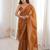 Mustard chiffon embroidered saree with unstitched blouse piece.