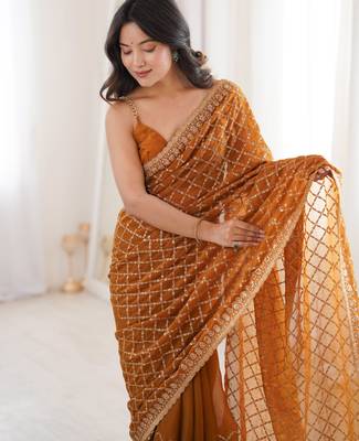 Mustard chiffon embroidered saree with unstitched blouse piece. 4