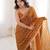 Mustard chiffon embroidered saree with unstitched blouse piece.