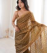 Olive chiffon embroidered saree with unstitched blouse piece.