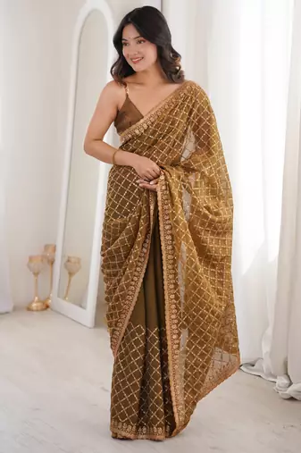 Olive chiffon embroidered saree with unstitched blouse piece.