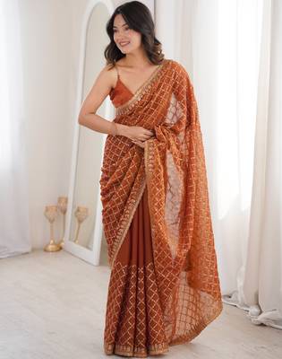 Orange chiffon embroidered saree with unstitched blouse piece. 2