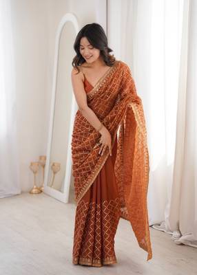 Orange chiffon embroidered saree with unstitched blouse piece. 3