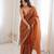 Orange chiffon embroidered saree with unstitched blouse piece.