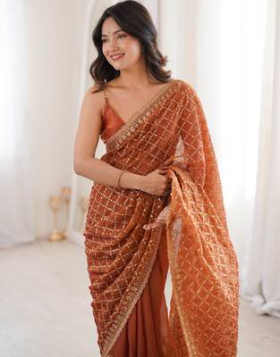 Orange chiffon embroidered saree with unstitched blouse piece. 4
