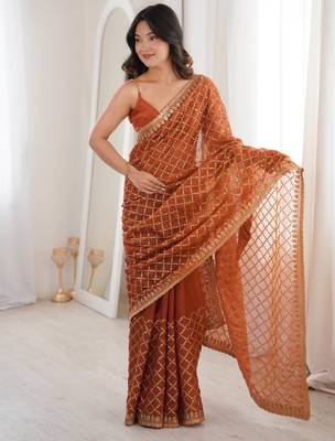 Orange chiffon embroidered saree with unstitched blouse piece. 5