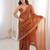 Orange chiffon embroidered saree with unstitched blouse piece.