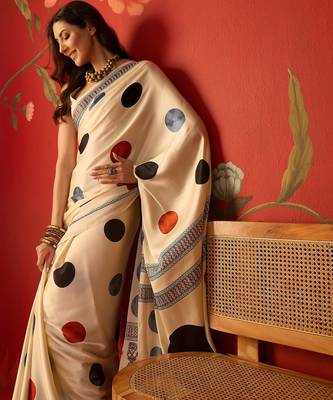 Cream satin printed saree with unstitched blouse piece. 1