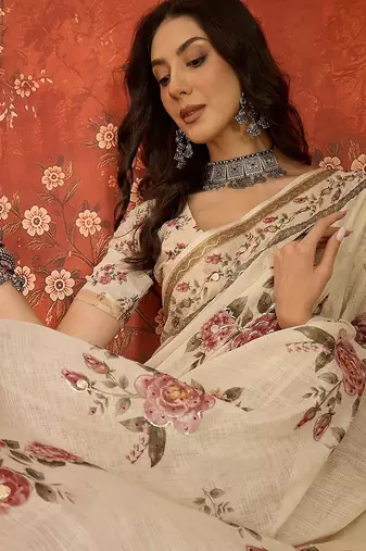 Cream linen gota patti saree with unstitched blouse piece.