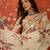 Cream linen gota patti saree with unstitched blouse piece.
