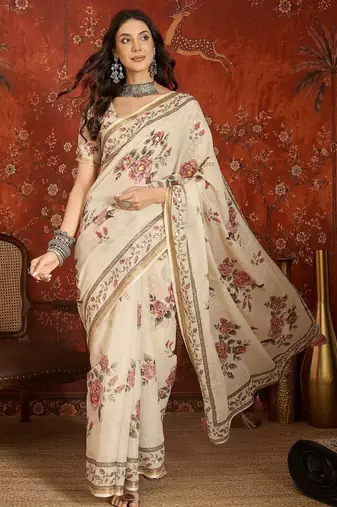 Cream linen gota patti saree with unstitched blouse piece.