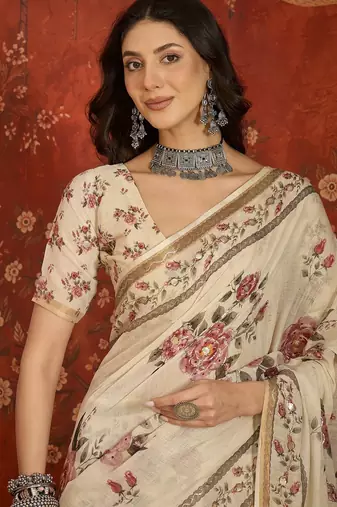 Cream linen gota patti saree with unstitched blouse piece.