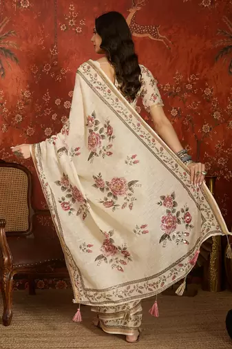 Cream linen gota patti saree with unstitched blouse piece.