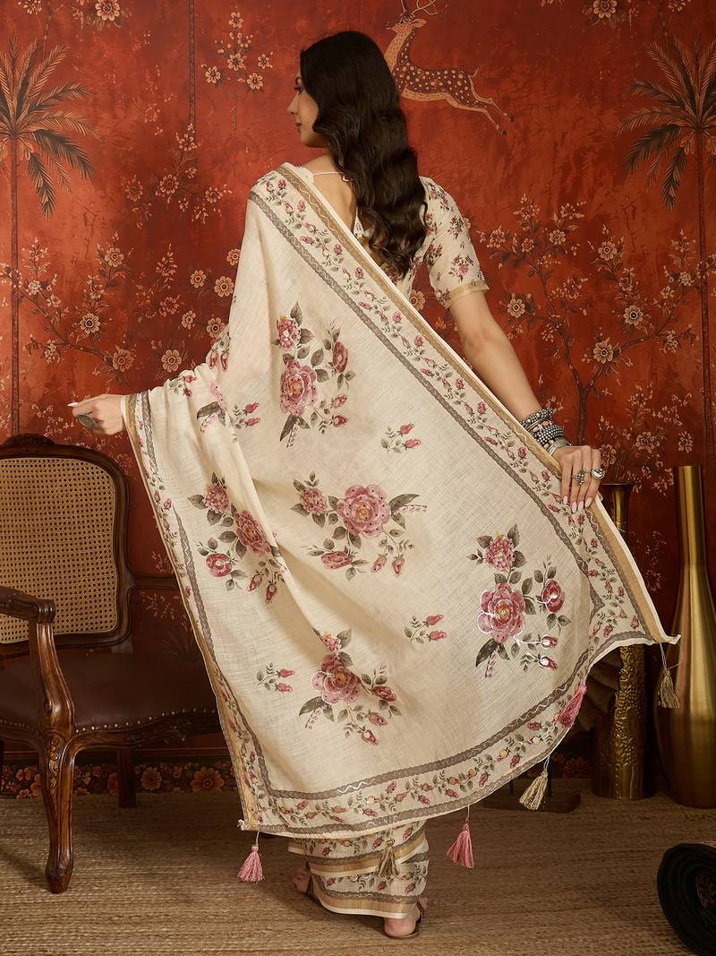 Cream linen gota patti saree with unstitched blouse piece.