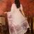 Baby pink linen embellished saree with unstitched blouse piece.