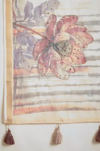 Baby pink linen embellished saree with unstitched blouse piece.