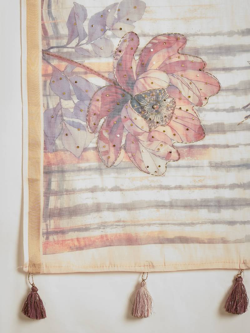 Baby pink linen embellished saree with unstitched blouse piece.