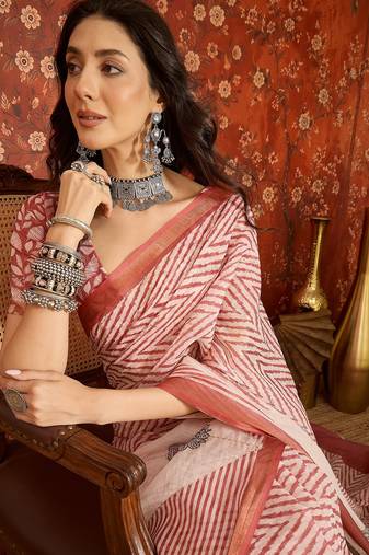 Pink linen sequins saree with unstitched blouse piece.