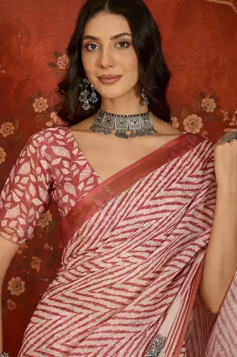 Pink linen sequins saree with unstitched blouse piece.