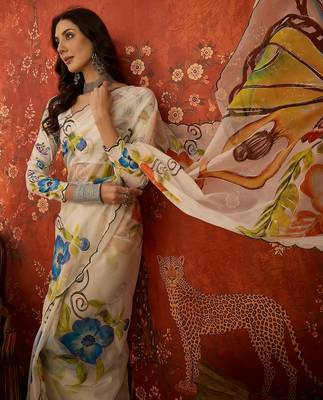 Off white organza printed saree with unstitched blouse piece. 1