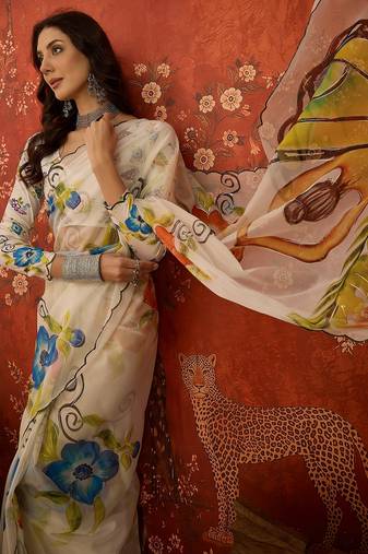 Off white organza printed saree with unstitched blouse piece.