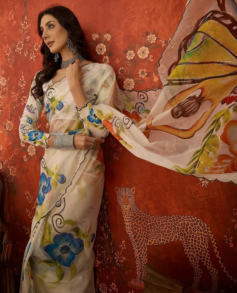 Off white organza printed saree with unstitched blouse piece.