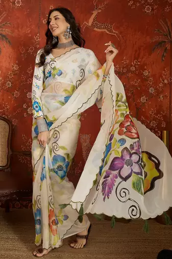 Off white organza printed saree with unstitched blouse piece.